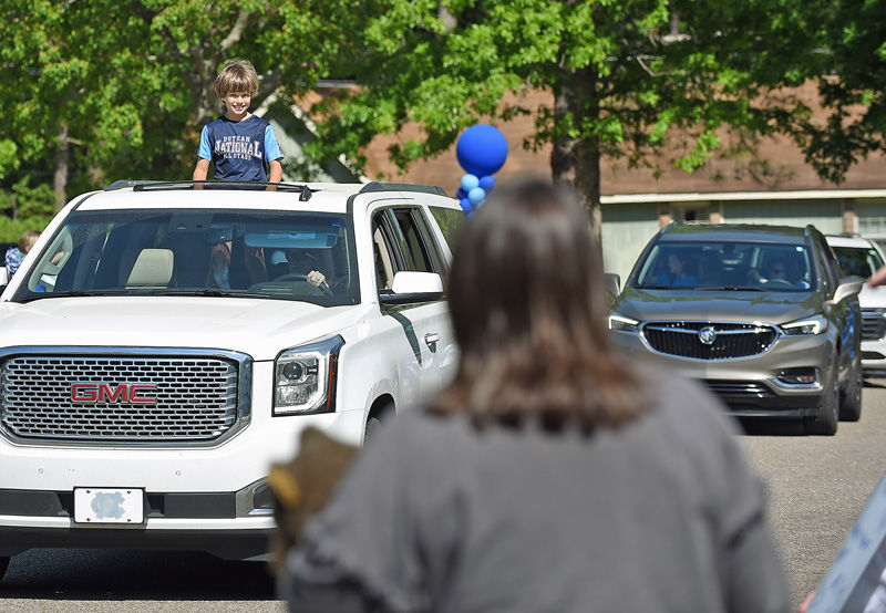 Teachers hold parade for students at Houston Academy